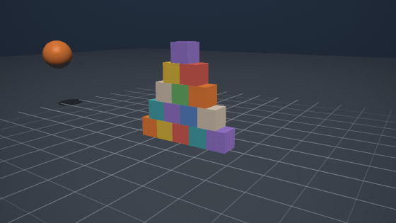A pyramid of crates struck by a heavy ball
